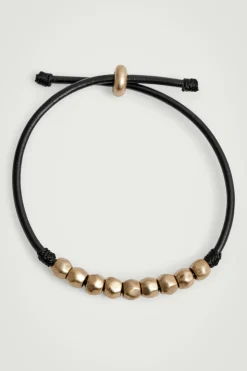COS Smycken*ARMBAND I LÄDER MED PÄRLOR