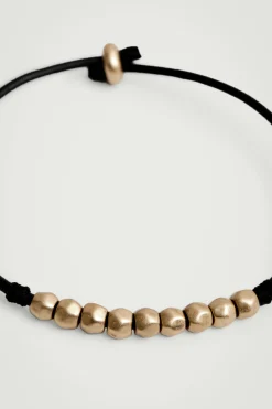 COS Smycken*ARMBAND I LÄDER MED PÄRLOR