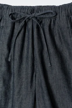 COS Byxor | Matchande Set*BYXOR I DENIM MED CYLINDERBEN OCH DRAGSKO