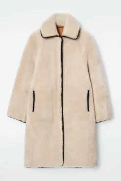 COS Jackor & Kappor*SHEARLINGKAPPA MED LÄDERDETALJER