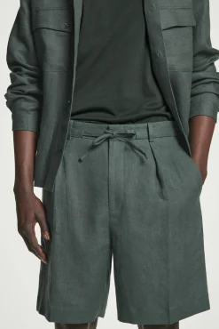 COS Kostymer | Shorts*SKRÄDDADE SHORTS I LINNE MED DRAGSKO